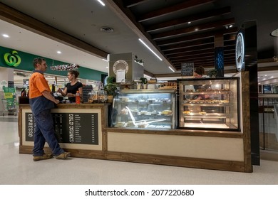 Townsville, Queensland, Australia - November 2021: Female Staff Serving Male Customer At Good Morning Coffee Shop Trader At Shopping Center