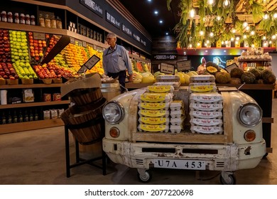 Townsville, Queensland, Australia - November 2021: Customer Shopping In Fruit Market With Eggs Loaded Into A Car As Display