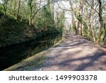 Towpath beside the old Tavistock canal which was constructed early in the 19th century to link the town of Tavistock to Morwellham Quay on the River Tamar.