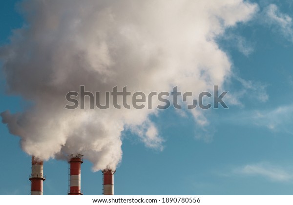 Toxic smoke from a factory chimney in the sky\
- industrial waste in the\
atmosphere