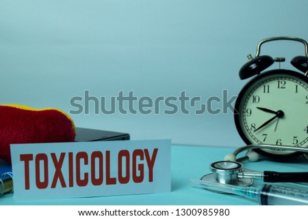 Toxicology Planning on Background of Working Table with Office Supplies. Medical and Healthcare Concept Planning on White Background