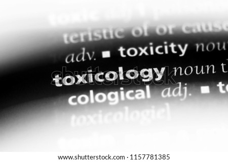 toxicology word in a dictionary. toxicology concept.