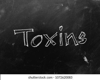 Toxins Handwritten On Blackboard