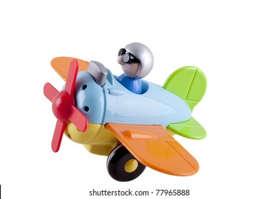 Toy Airplane With A Pilot On A White Background