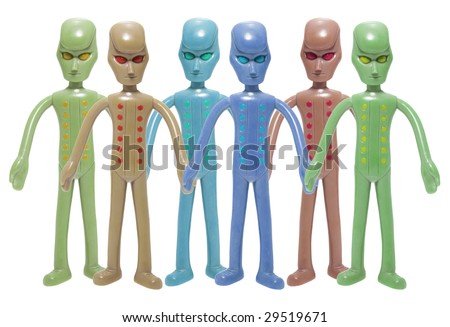 Toy Alien Figures on Isolated White Background