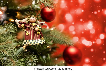 Toy Angel Hanging On The Christmas Tree 