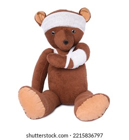 Toy Bear With Bandages Isolated On White