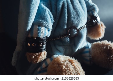 Toy Bear Is Kneeling, Facing The Wall, Hands Behind His Back In Handcuffs. Child Abuse. Abduction Of Children. Slavery And The Sale Of People. Psychological Violence In The Family, Society And School.