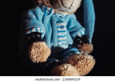 Toy Bear Is Kneeling, Facing The Wall, Hands Behind His Back In Handcuffs. Child Abuse. Abduction Of Children. Slavery And The Sale Of People. Psychological Violence In The Family, Society And School.