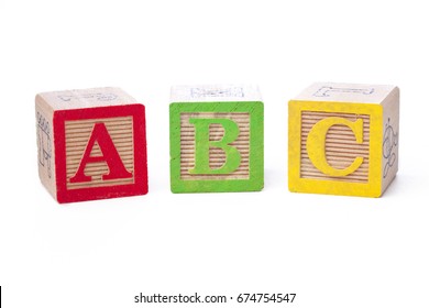 Toy blocks isolated on white spelling abc - Shutterstock ID 674754547