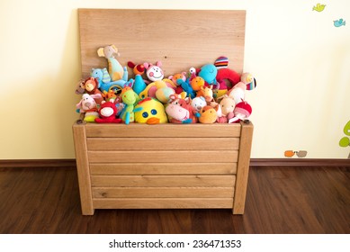 Toy Box full of soft toys in a child's bedroom