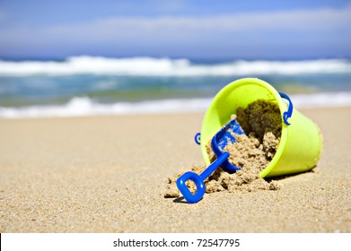 Toy Bucket And Shovel On The Beach