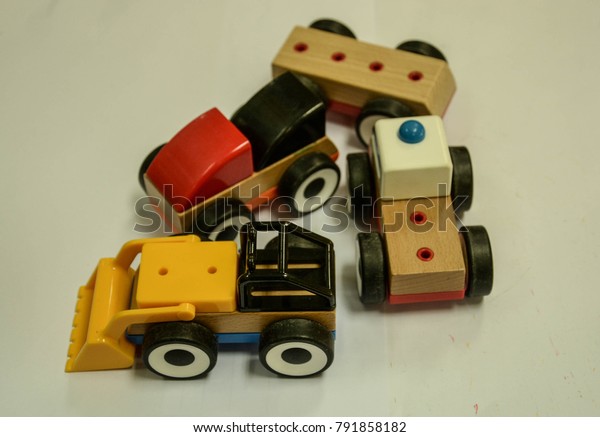 toy car\
made of plastic  and wood for kids to play\
