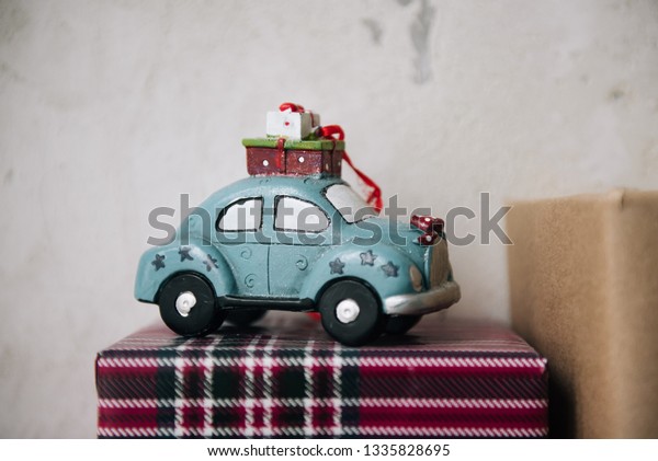 toy car on a\
light background, festive\
mood