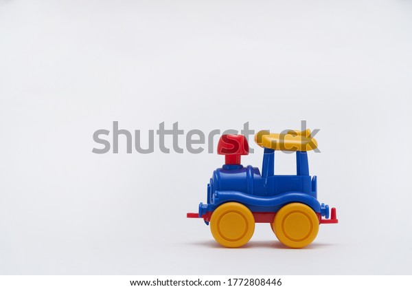 Toy car on white\
background