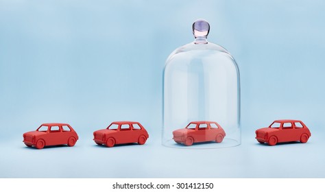 Toy Car Protected Under A Glass Dome On Blue Background