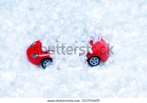 toy car strewn
with artificial
snow.Closeup