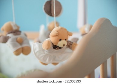 Toy Carousel, Above The Baby Bed.