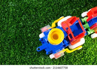 Toy Color Train On The Grass, Top View