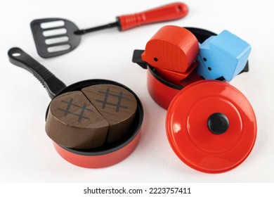 Toy Cooking Utensils And Wooden Food. Play House Image