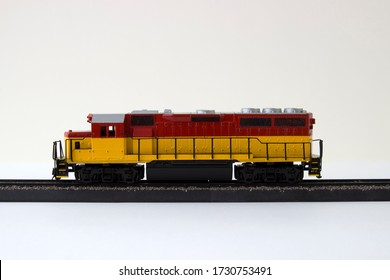 Toy Diesel Locomotive Side View In White Background