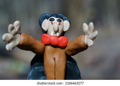 A Toy Dracula Made Of Plasticine Is Trying To Scare. Halloween-themed Toys.