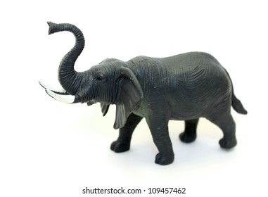 A Toy Elephant On White Background