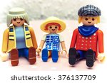 Toy family: mother, father and their child.