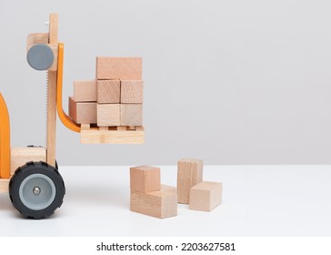 Toy Forklift. Business Concept. Front View