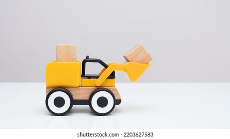 Toy Forklift. Business Concept. Front View