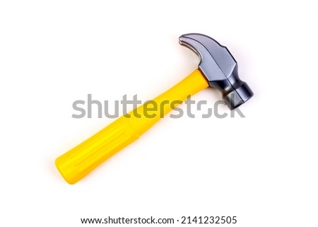 Toy. The hammer isolated on white background. Top view.The hammer isolated on white background. Top view
