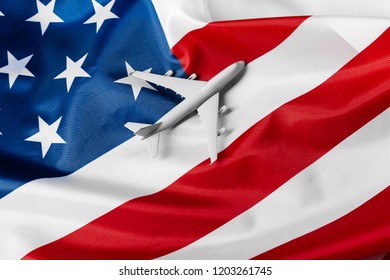 Toy Jet Plane And Flag Of USA.