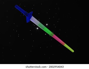 Toy Laser Sword On Black Background