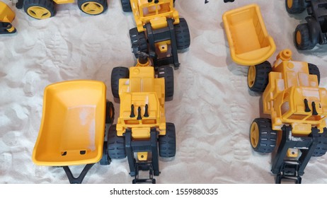 Toy machines on the sand. Play ground. - Shutterstock ID 1559880335