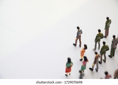 Toy, miniature figures of human in costumes. - Shutterstock ID 1729070698