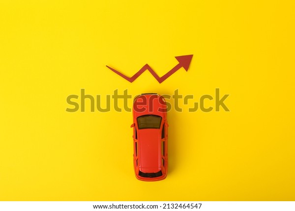 Toy model\
auto growth arrow on yellow\
background