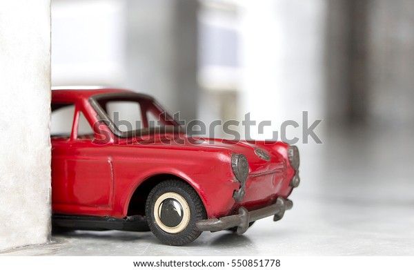 Toy model car, old red\
car