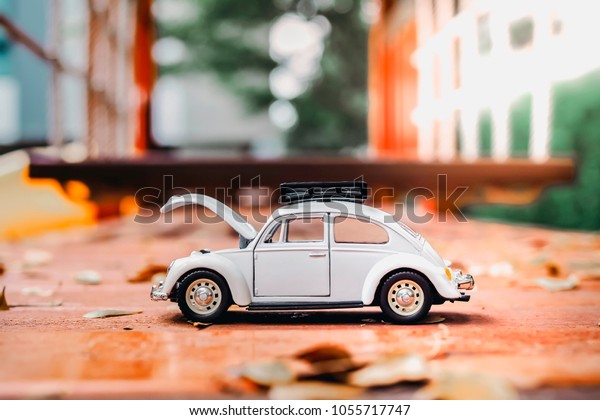 Toy model\
car Volkswagen. Vintage car model. Old retro beetle car for\
collectors. Bangkok, Thailand on March 9,\
2018