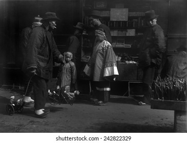 THE TOY PEDDLER. Chinese Immigrants In San Francisco. From Arnold Genthe's CHINATOWN SERIES. Ca. 1896.