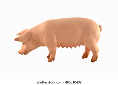 Toy pig  isolated on white. Farm animal - cute, pink, funny  toy pig isolated on white/Toy pig  isolated on white.