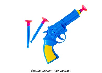 Toy pistol. Children's pistol on a white background. Blue pistol with suction cups.