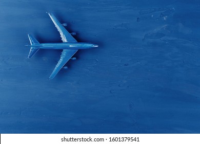 Toy Plane On Classic Blue Background, Top View