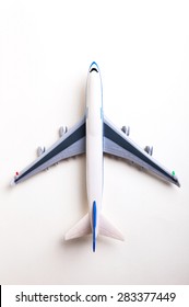 Toy Plane On White Background, Top View