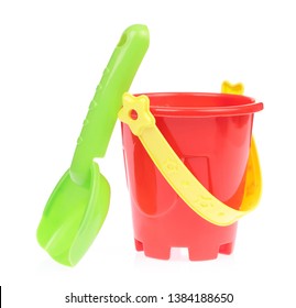 Toy Plastic Bucket With Spade Isolated On White Background