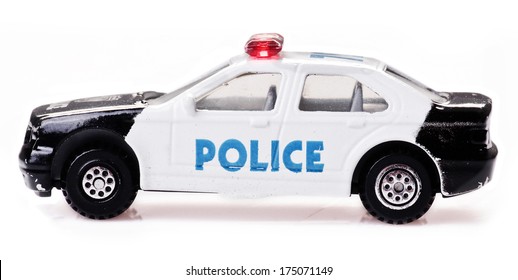 Toy Police Car On A White Background