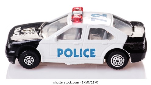 Toy Police Car On A White Background