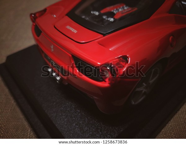 Toy R Us, Selangor, Malaysia - December 2018:\
Closeup Ferrari 458 Italia made by Burago display for sale in toy\
store. Ferrari is an Italian luxury sports car manufacturer based\
in Maranello