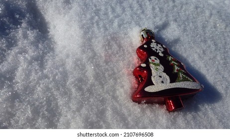 Toy Red Spruce On A Background Of Snow