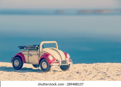 Toy retro car - a symbol of travel and adventure