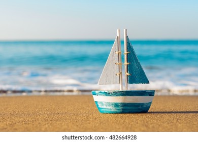 Toy Sailboat At The Seashore